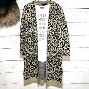 Sanctuary leopard print sweater duster. Side slits patch pockets.